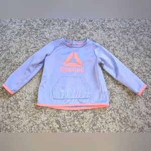 2/$20. Reebok girls sweater. Light purple. 2T.  Excellent condition.